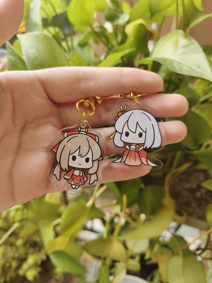 Customer holding finished custom acrylic charms
